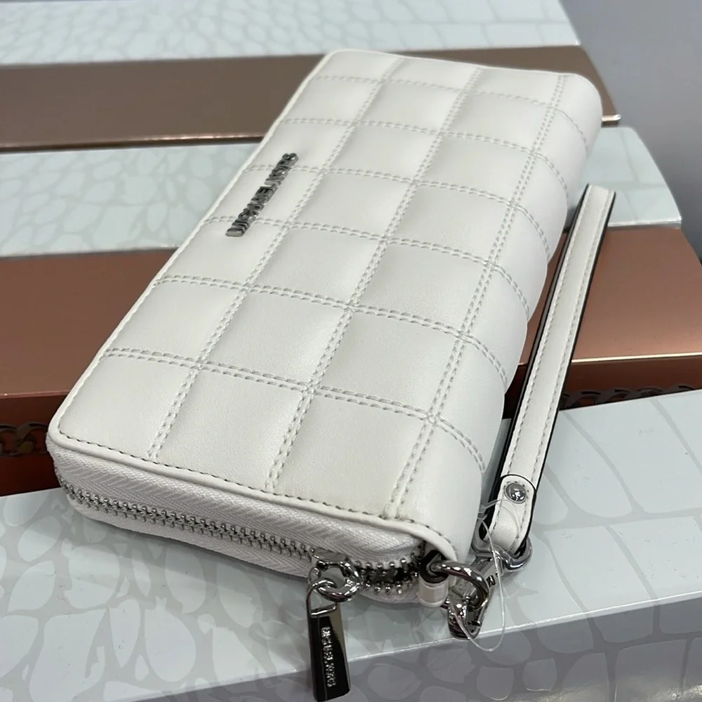 MICHAEL KORS
Continental Wristlet Phone Case Wallet
Optic White
NWT - Picture 7 of 16